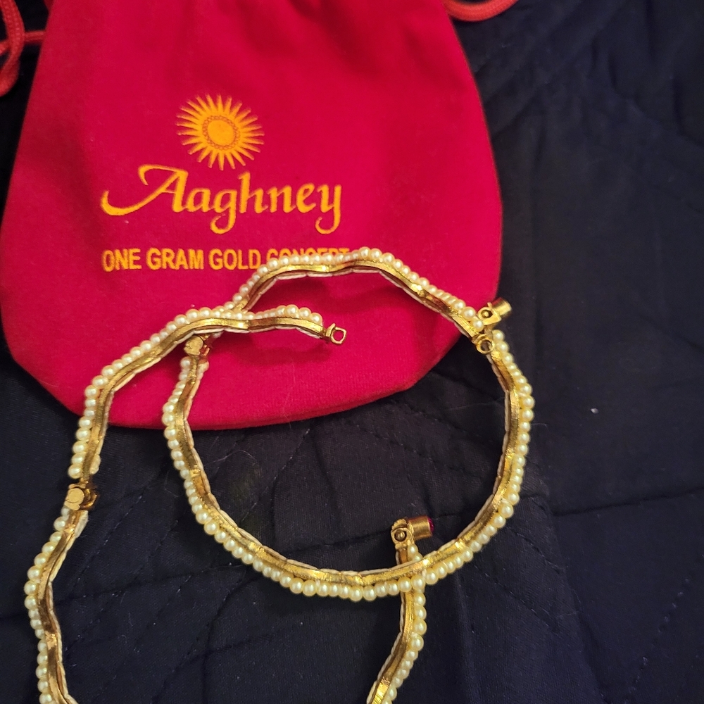 Gold and Pearl bracelets